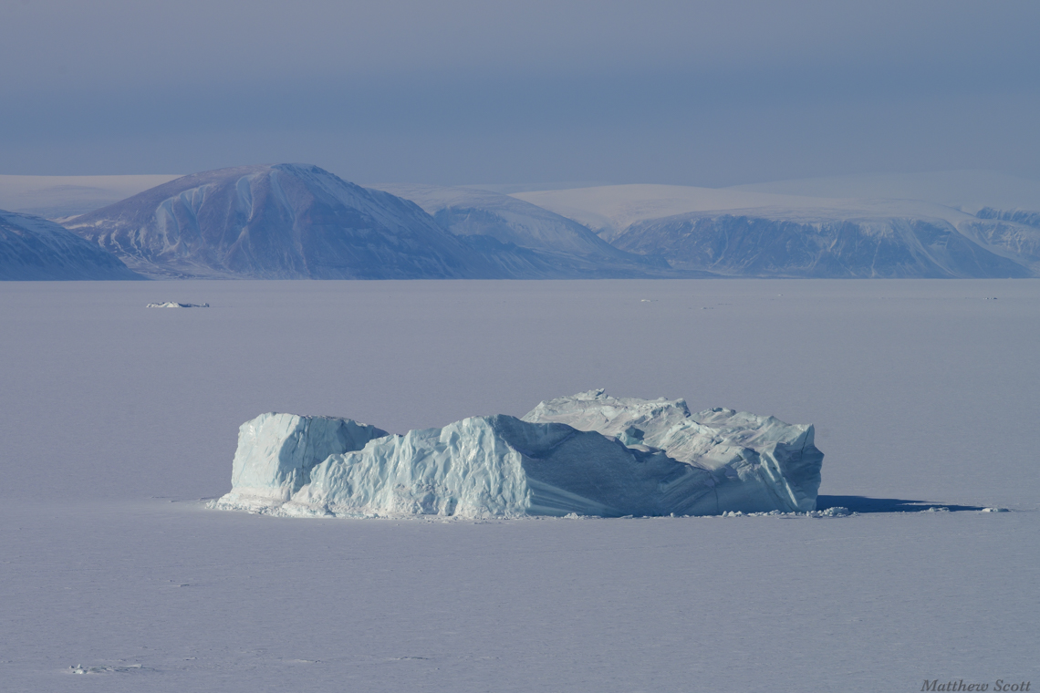 Sea ice and an iceberg near Qaanaaq, Greenland